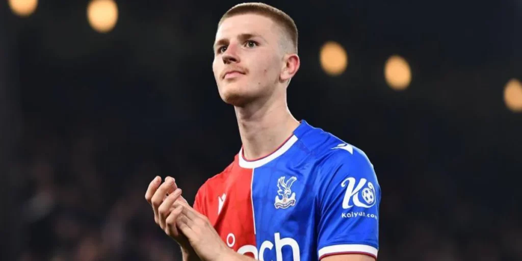 Adam Wharton applauding the fans