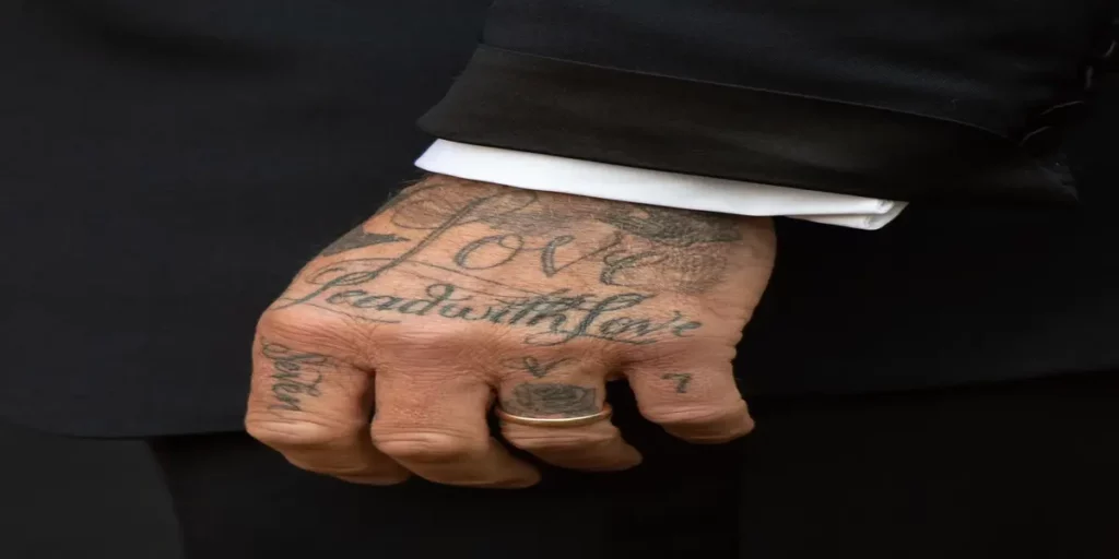 David Beckham Left Hand Tattoos (Image Credits- X- @voguejp)