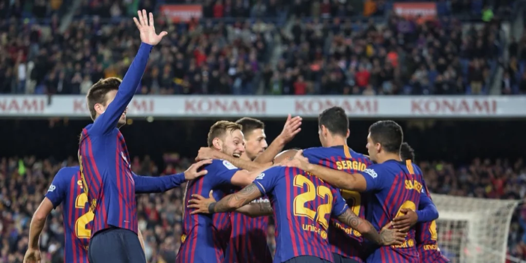Barcelona team celebrating their 5-0 win