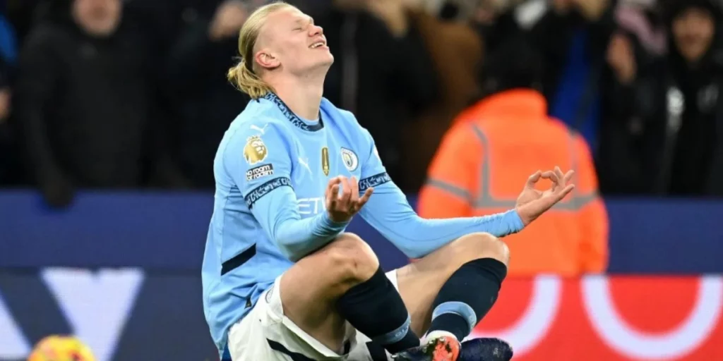 Erling Haaland performs his trademark celebration after scoring 