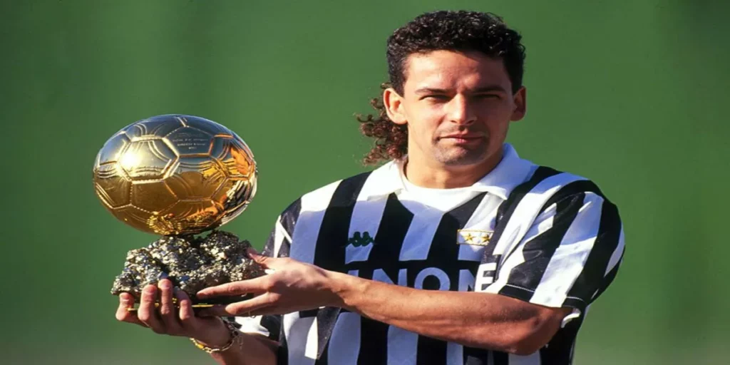 The Legendary Roberto Baggio holding the prestigious Ballon d'Or Award (Image Credits- X- @Football__Tweet)