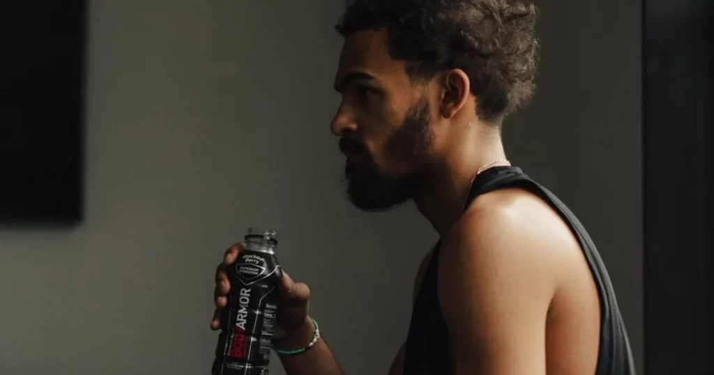 Trae Young with BodyArmor drink