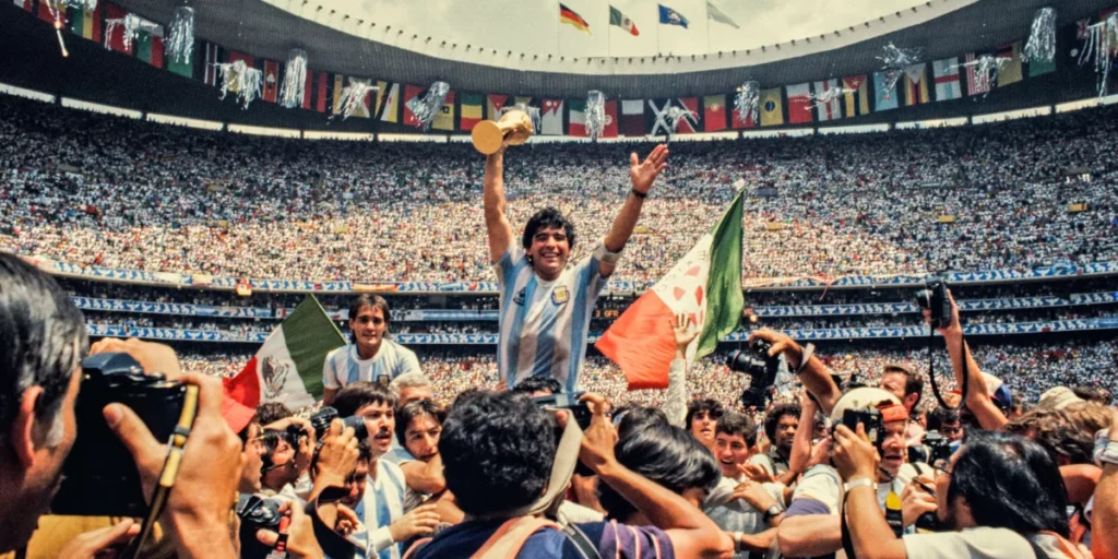 Diego Maradona lifting the 1986 World Cup at the Azteca Stadium