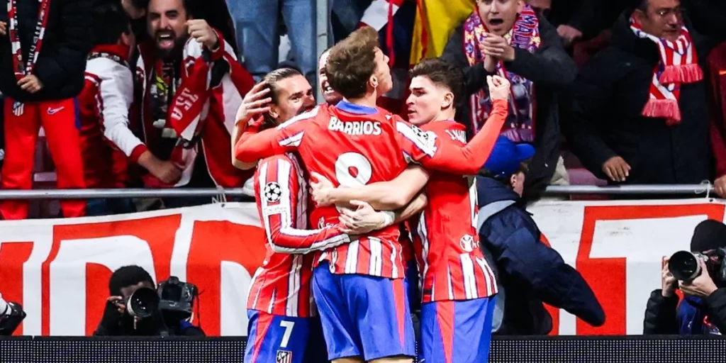 Atletico Madrid celebrate their opening goal of the night