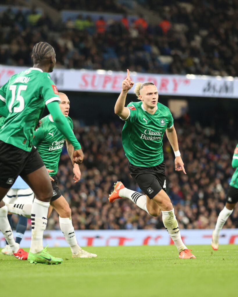 Maksym Talovierov celebrating his goal against Manchester City