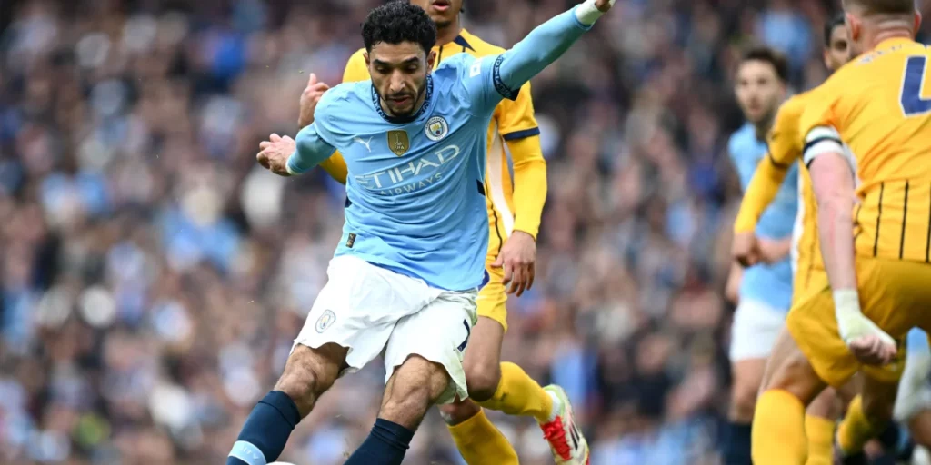 Omar Marmoush in action for Man City