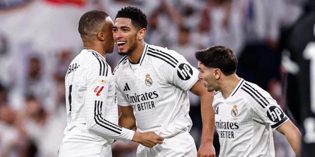 Real Madrid players celebrating the goal