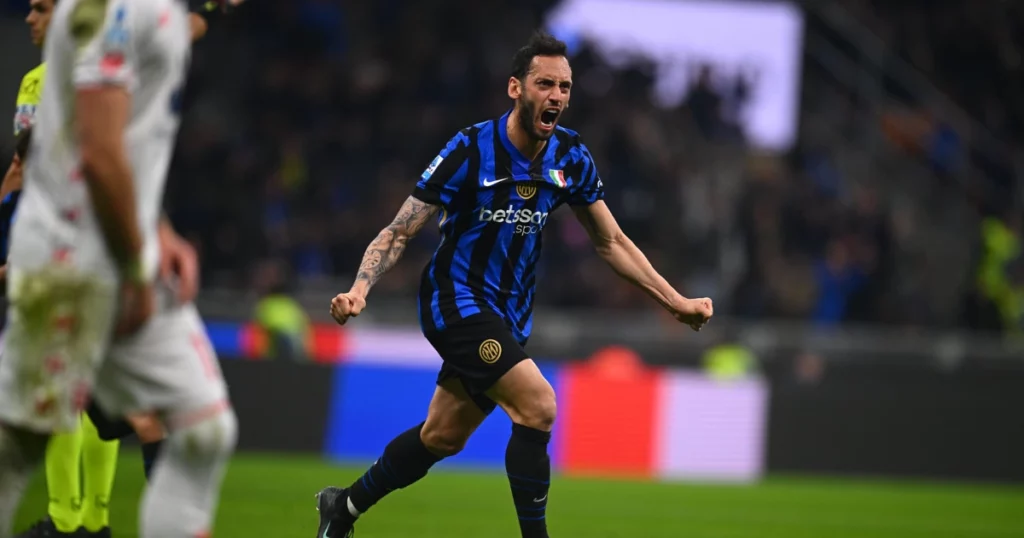 Hakan Calhanoglu celebrates the equaliser against Monza