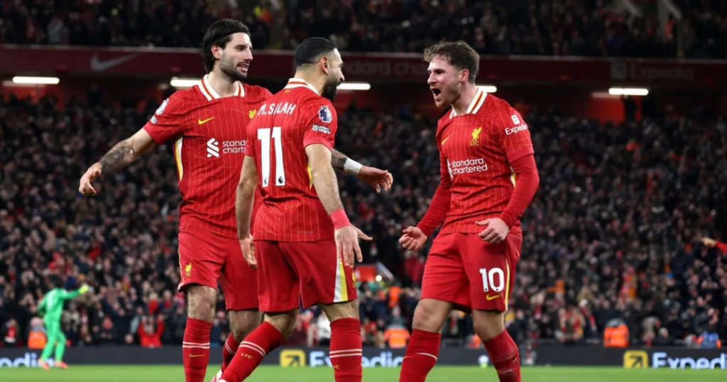 Liverpool players celebrate a goal in EPL