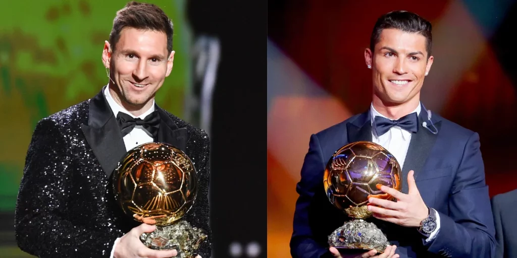 Lionel Messi and Cristiano Ronaldo posing with their Ballon d'or trophies.