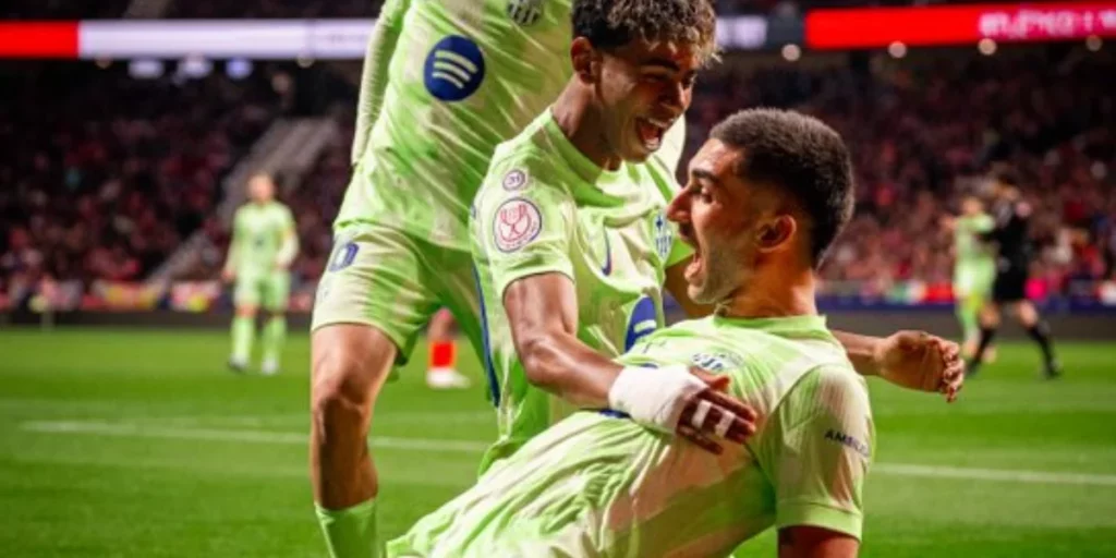 Lamine Yamal and Ferran Torres celebrating the opening goal.