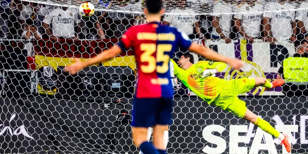 Tibo Courtois making a flying save
