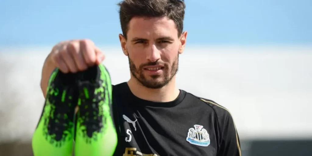 Fabian Schar posing with his Puma shoes