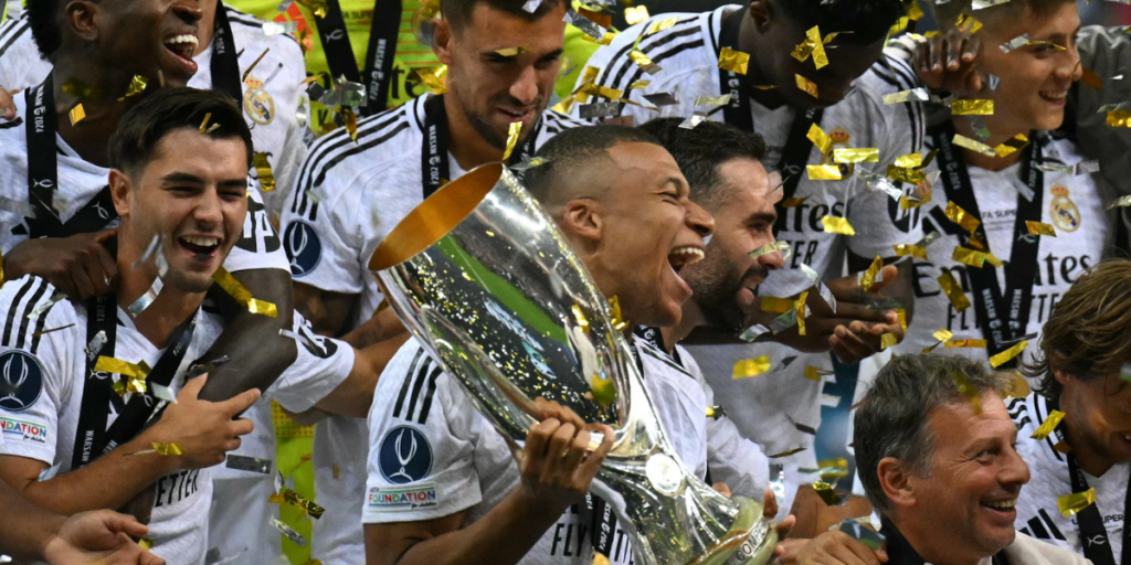 Kyliam Mbappe with the Super Cup for Madrid